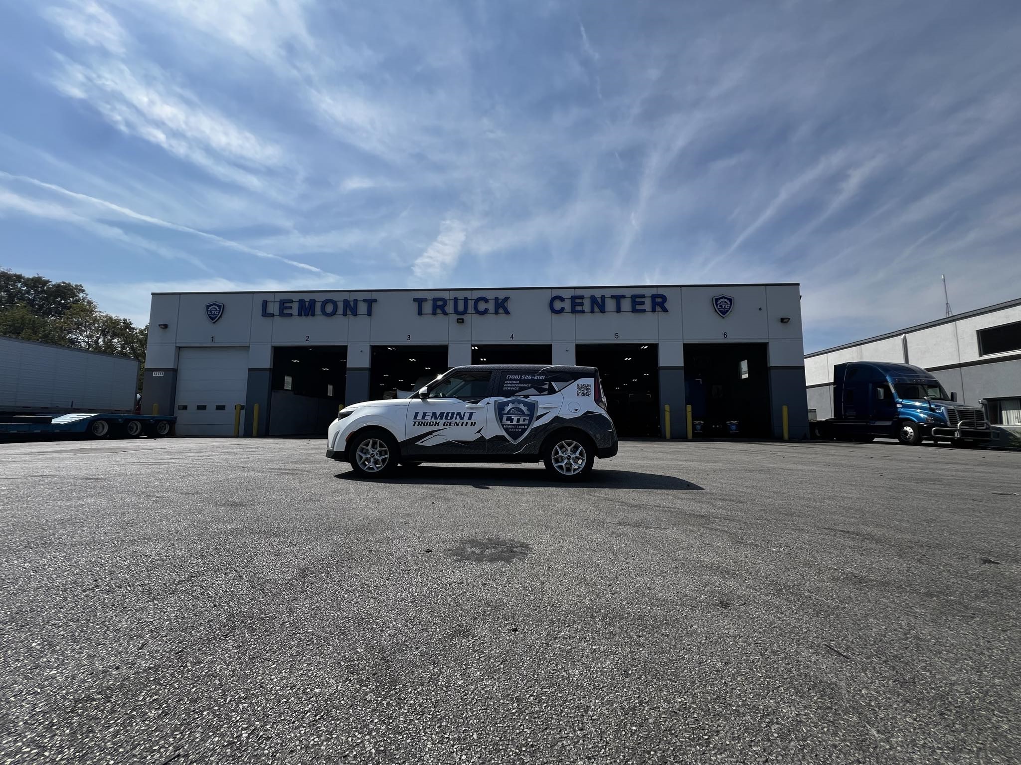 Vehicle being serviced in an automotive repair workshop